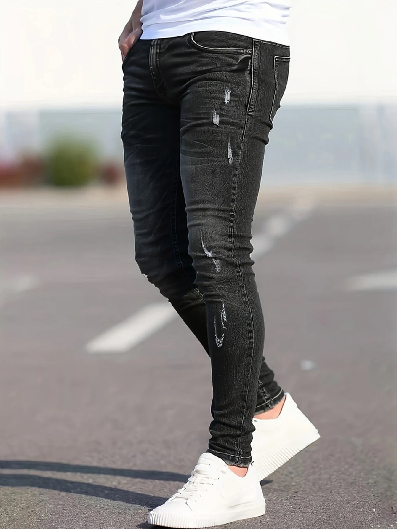 Men's black skinny design Jeans.