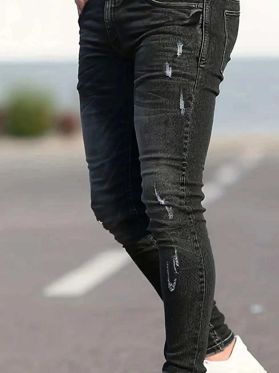 Men's black skinny design Jeans.